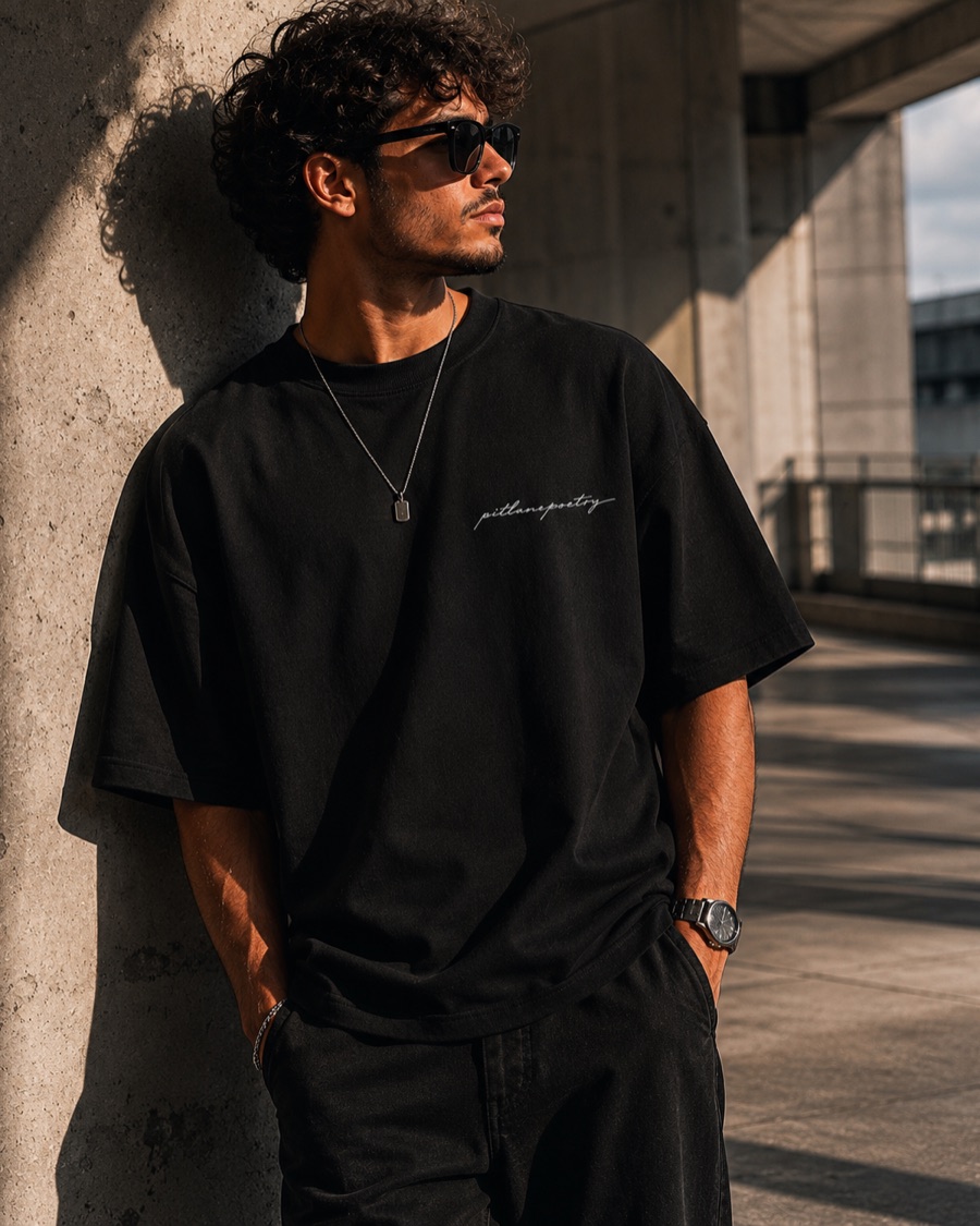 DROP 001 tee worn, front with the pitlanepoetry chest script